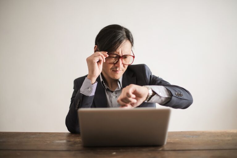 A person writing in a notebook as a metaphor for customer complaint, records, and brand trust