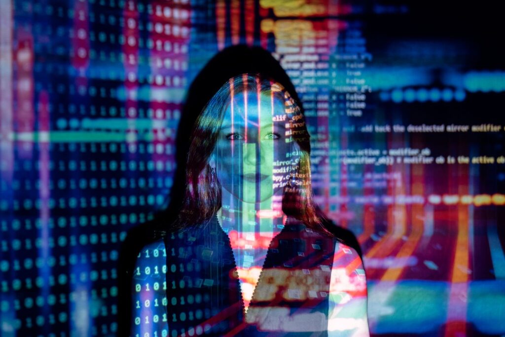 A person working in front of digital screens, representing the difference between regular Web2 campaigns and Web3 participation.